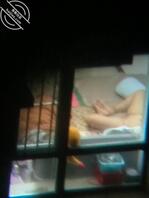 偷拍对面的少妇1