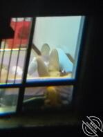 偷拍对面楼的少妇0